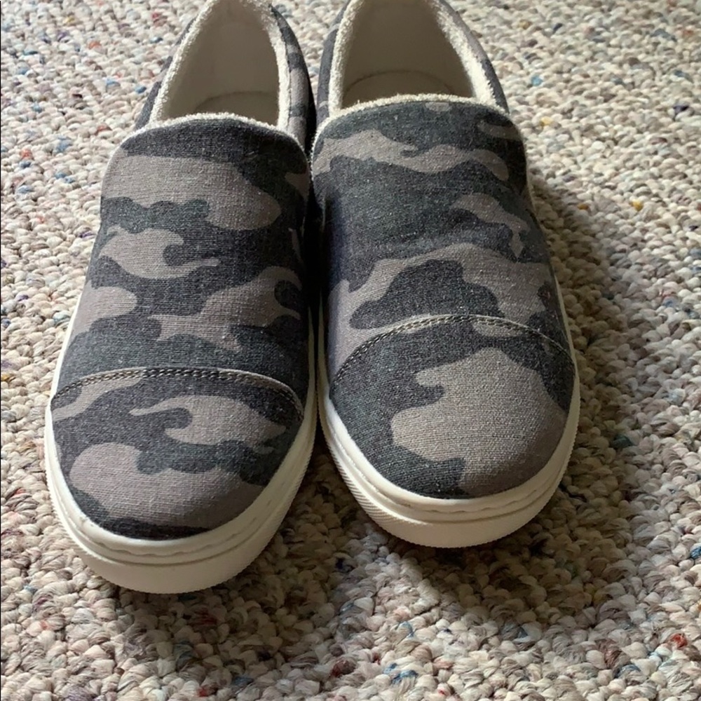Sketchers camouflage, loafer type tennis shoe.